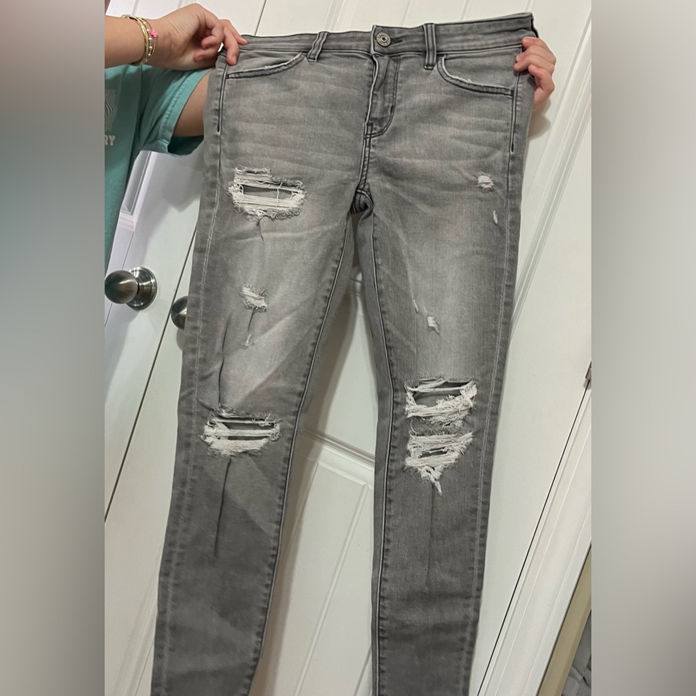 grey jeans